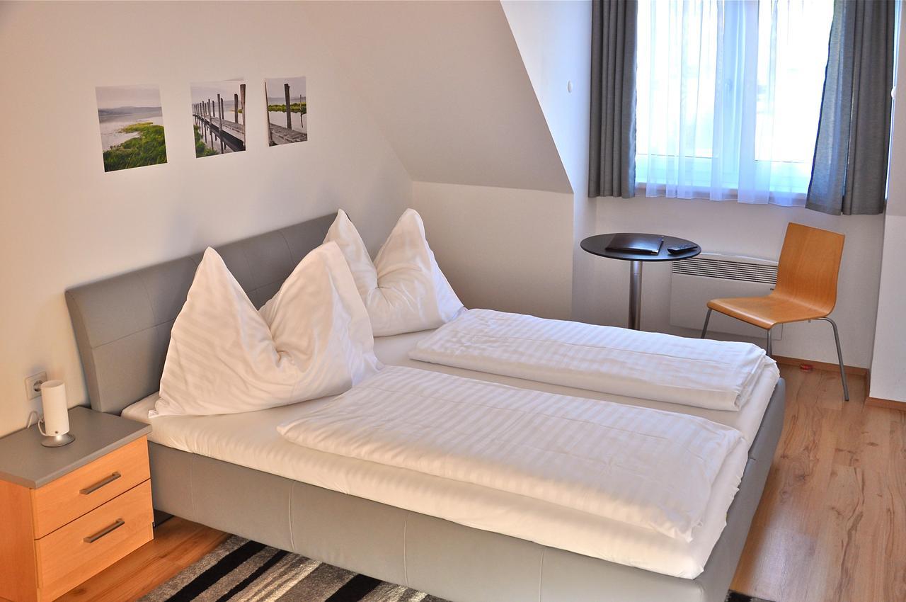 Hotel Am See Rust Bagian luar foto